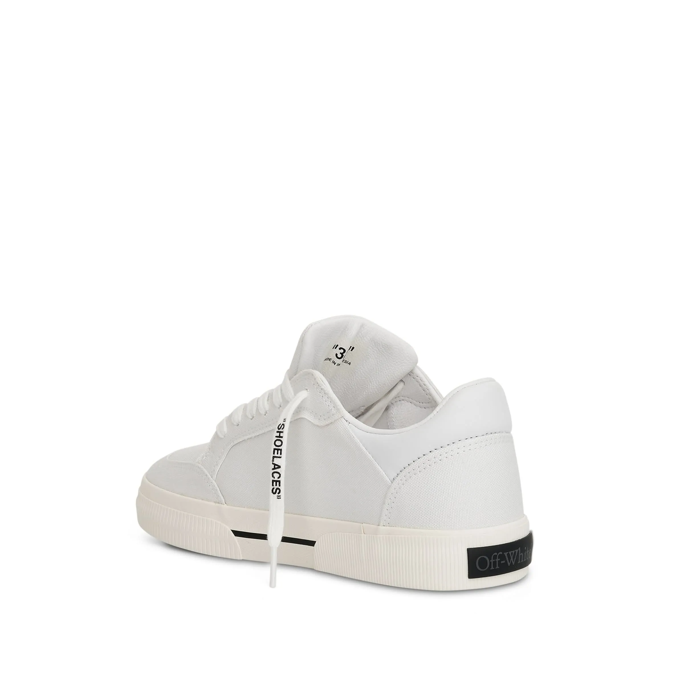 Women New Low Vulcanized Canvas Sneaker in White/Black